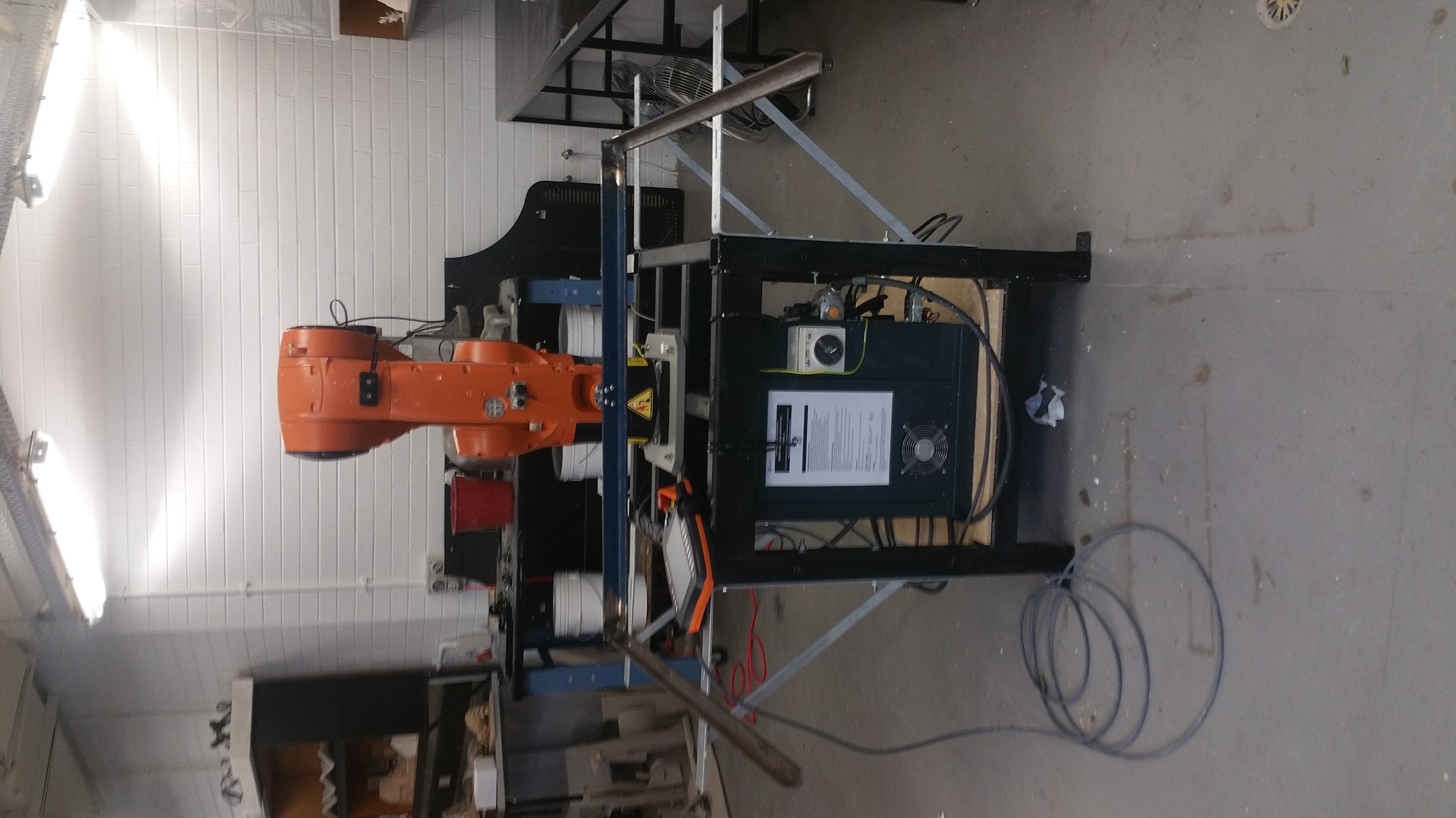 KUKA robot with wire cutter attachment